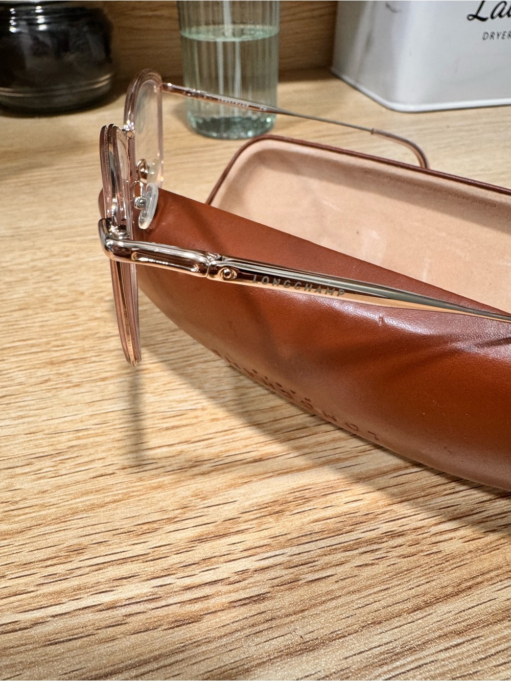 Longchamp Women's Rose Gold Rimless Sunglasses with Pink Tint